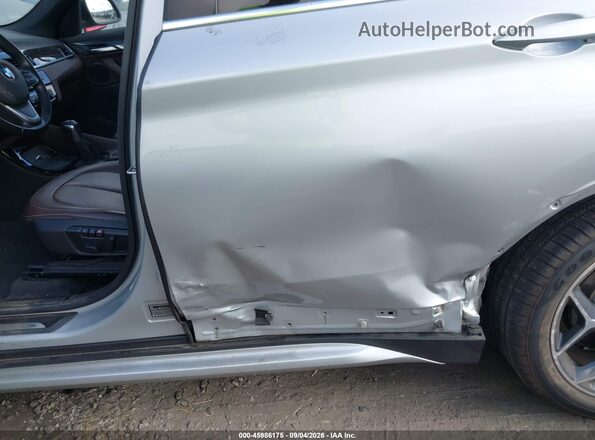 WBXHT3C33G5F65699 2016 BMW X1 Silver Front view