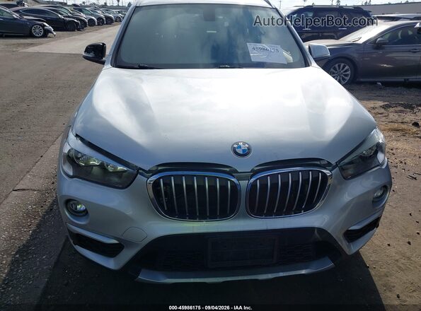 WBXHT3C33G5F65699 2016 BMW X1 Silver Rear interior view