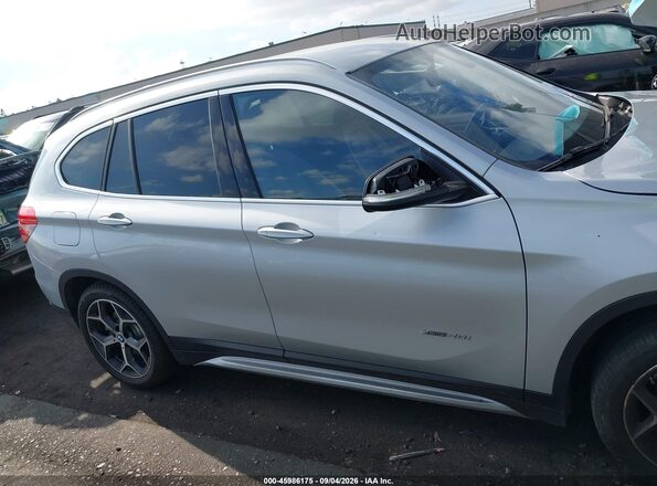 WBXHT3C33G5F65699 2016 BMW X1 Silver 360 interior view