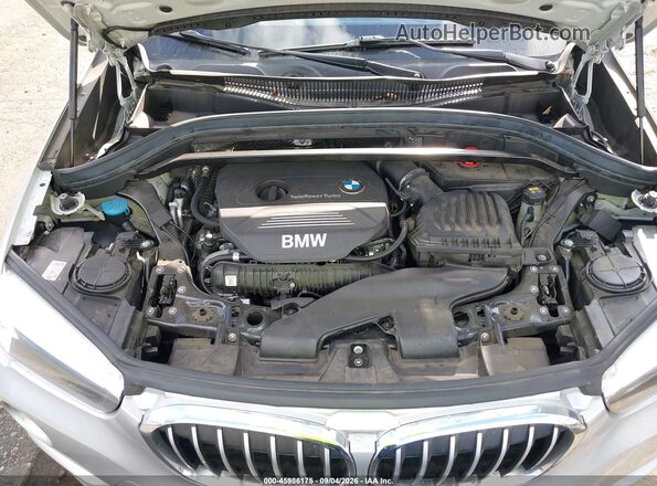 WBXHT3C33G5F65699 2016 BMW X1 Silver Rear view