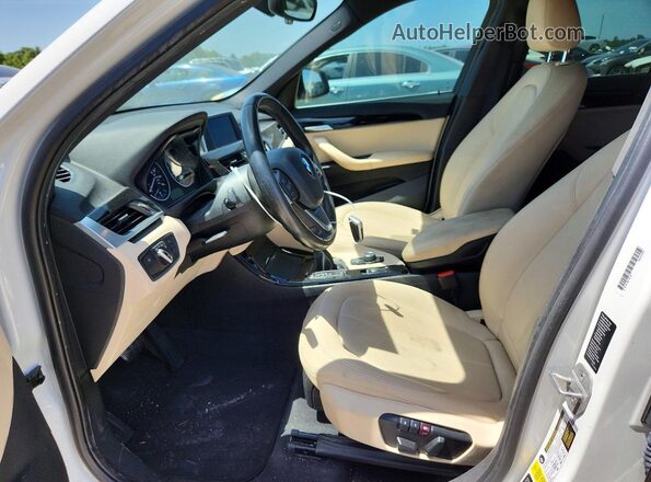 WBXHT3C33G5F67372 2016 BMW X1 White Front interior view