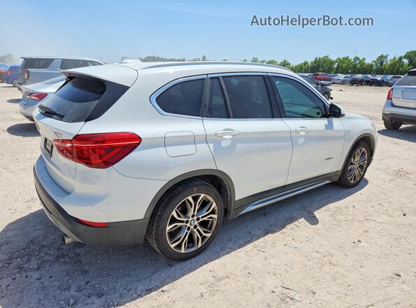 WBXHT3C33G5F67372 2016 BMW X1 White Rear right