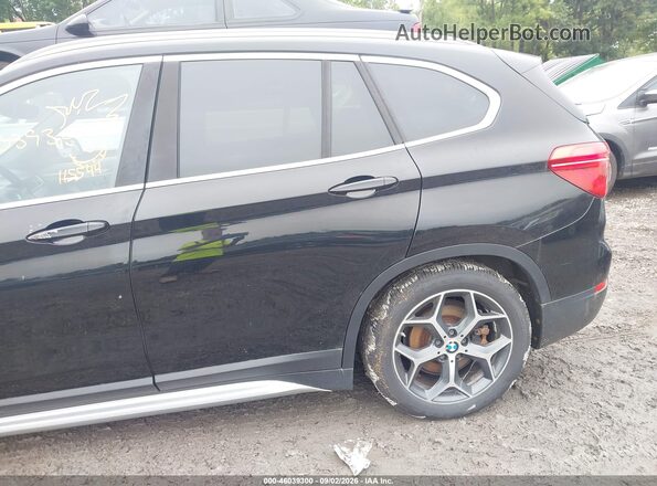 WBXHT3C38G5E53092 2016 BMW X1 Black წინა ხედი