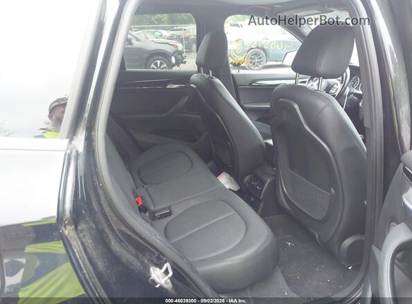 WBXHT3C38G5E53092 2016 BMW X1 Black VIN კოდის სტიკერის ხედი