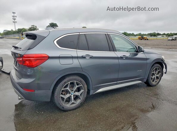 WBXHT3C38G5F64094 2016 BMW X1 Gray Rear right