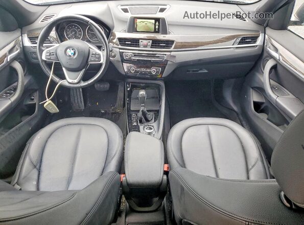 WBXHT3C38G5F64094 2016 BMW X1 Gray Dashboard view