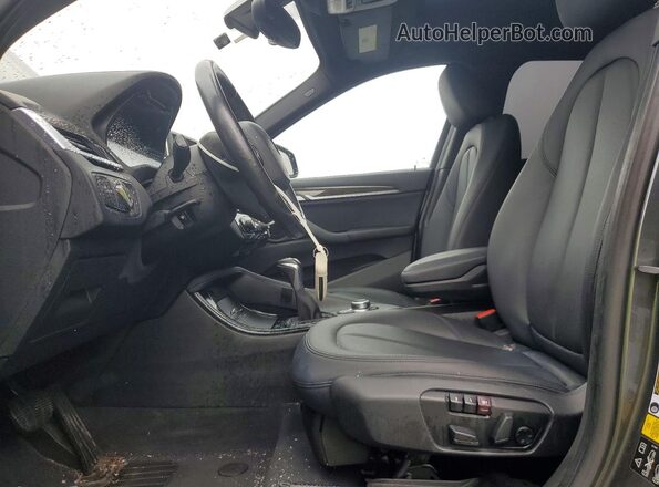 WBXHT3C38G5F64094 2016 BMW X1 Gray Front interior view