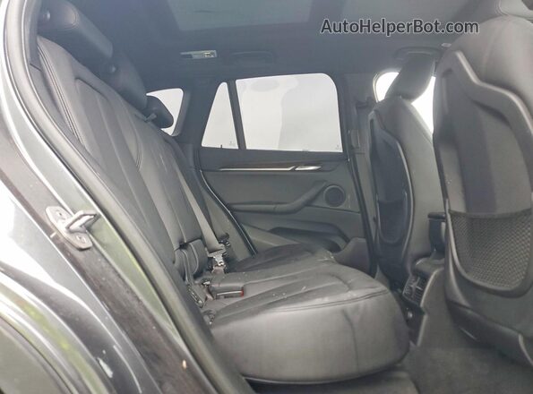 WBXHT3C38G5F64094 2016 BMW X1 Gray Rear interior view