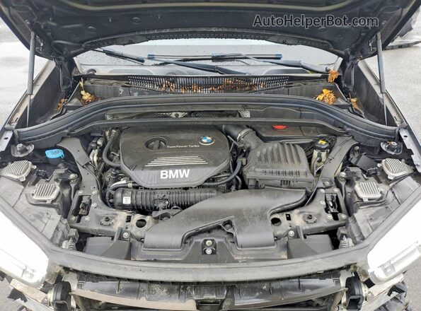 WBXHT3C38G5F64094 2016 BMW X1 Gray Engine compartment view