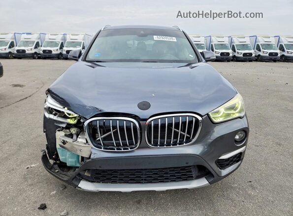 WBXHT3C38H5F81981 2017 BMW X1 Gray Front view