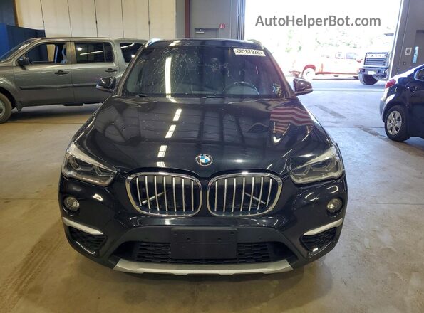 WBXHT3C39H5F67765 2017 BMW X1 Black Вид спереду