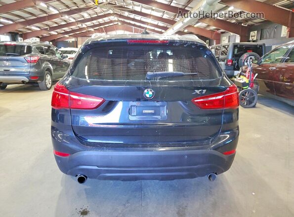 WBXHT3C39H5F67765 2017 BMW X1 Black Вид ззаду
