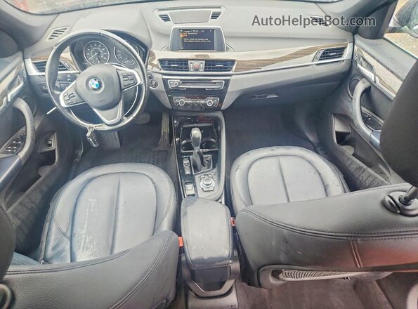 WBXHT3C3XGP881165 2016 BMW X1 Black Widok deski rozdzielczej
