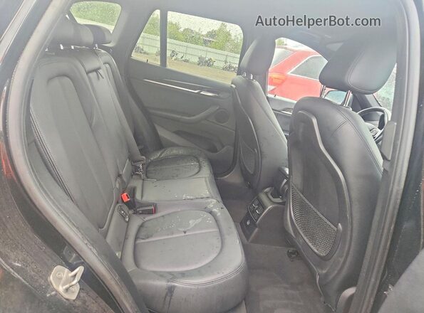 WBXHT3C3XGP881165 2016 BMW X1 Black Widok wnętrza z tyłu