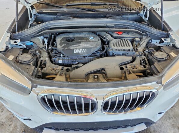 WBXHT3C59K5L36211 2019 BMW X1 White Սալոնի հետևի տեսք