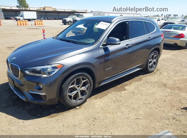 WBXHT3Z32G4A49895 2016 BMW X1 Gray წინა მარცხენა ხედი სამი მეოთხედიდან