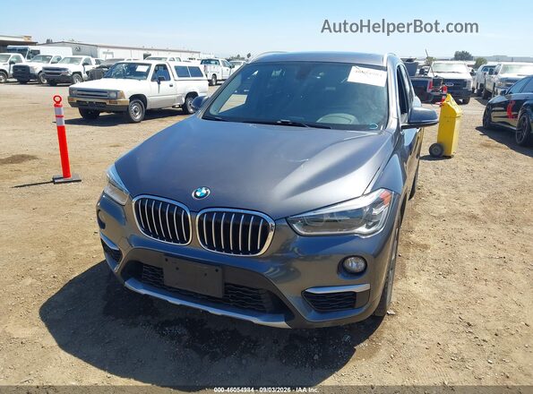 WBXHT3Z32G4A49895 2016 BMW X1 Gray წინა ხედი