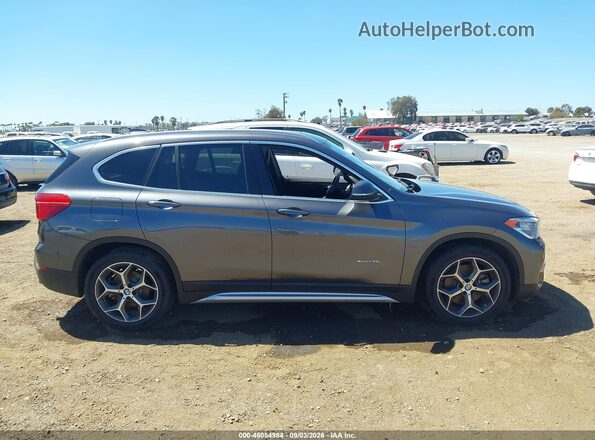 WBXHT3Z32G4A49895 2016 BMW X1 Gray უკანა სალონის ხედი
