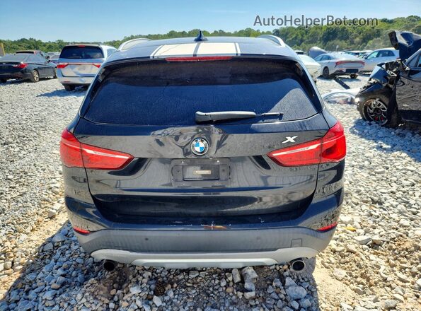 WBXHT3Z37G4A49648 2016 BMW X1 Black Вид ззаду