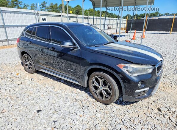 WBXHT3Z37G4A49648 2016 BMW X1 Black Передня права чверть
