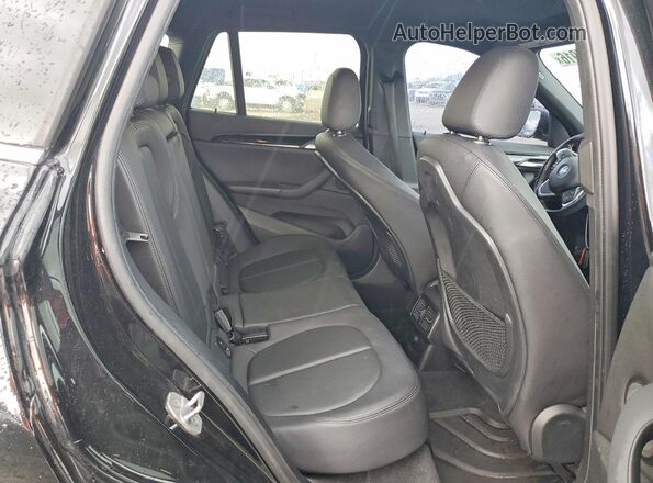 WBXHU7C32J5L05853 2018 BMW X1 Black Rear interior view