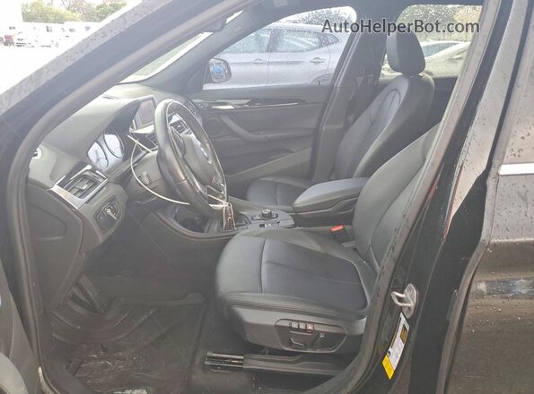 WBXHU7C32J5L05853 2018 BMW X1 Black Front interior view