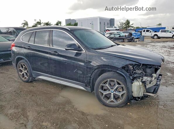 WBXHU7C32J5L05853 2018 BMW X1 Black Front right