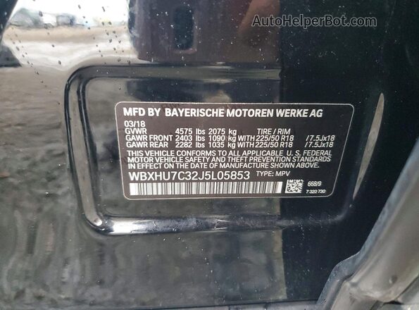 WBXHU7C32J5L05853 2018 BMW X1 Black VIN sticker view