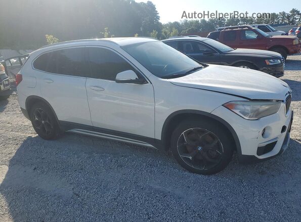 WBXHU7C32J5L07585 2018 BMW X1 White Front right