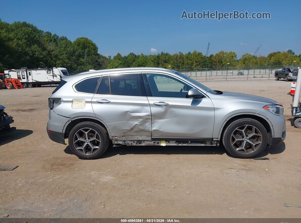 WBXHU7C33J3H43926 2018 BMW X1 Silver Вид задньої частини салону