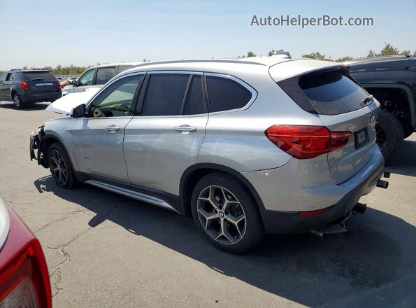 WBXHU7C34H5H34182 2017 BMW X1 Silver Tył lewy