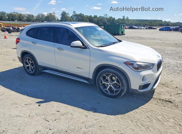 WBXHU7C35H5H37592 2017 BMW X1 White Front right