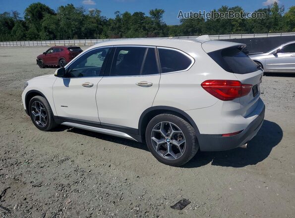 WBXHU7C35H5H37592 2017 BMW X1 White Rear left