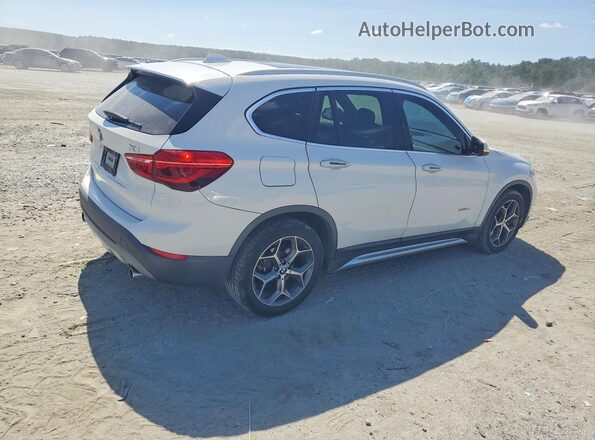 WBXHU7C35H5H37592 2017 BMW X1 White Rear right