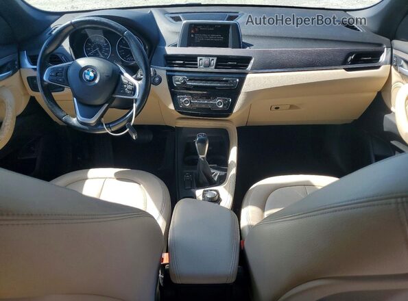 WBXHU7C35H5H37592 2017 BMW X1 White Dashboard view