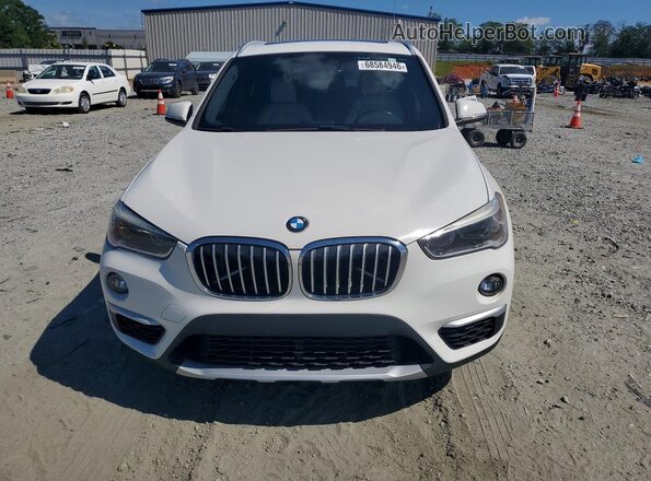 WBXHU7C35H5H37592 2017 BMW X1 White Front view