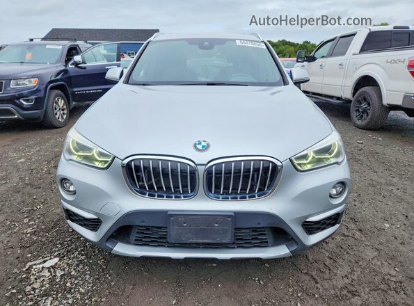 WBXHU7C39J3F04350 2018 BMW X1 Silver Front view