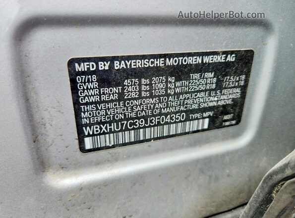 WBXHU7C39J3F04350 2018 BMW X1 Silver VIN sticker view