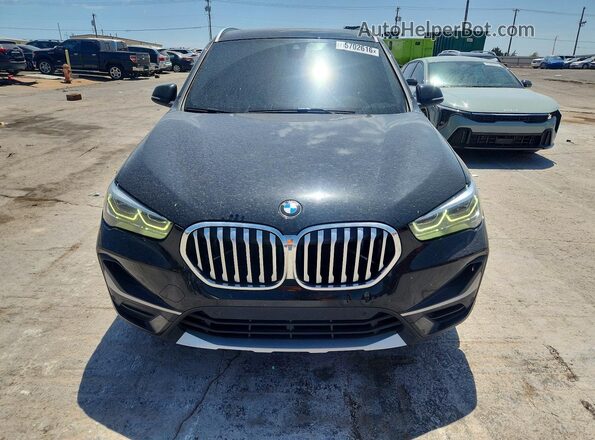 WBXJG7C07M5T35644 2021 BMW X1 Black Դիմացի տեսք
