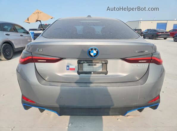 WBY43AW05RFR59926 2024 BMW I4 Silver Rear view