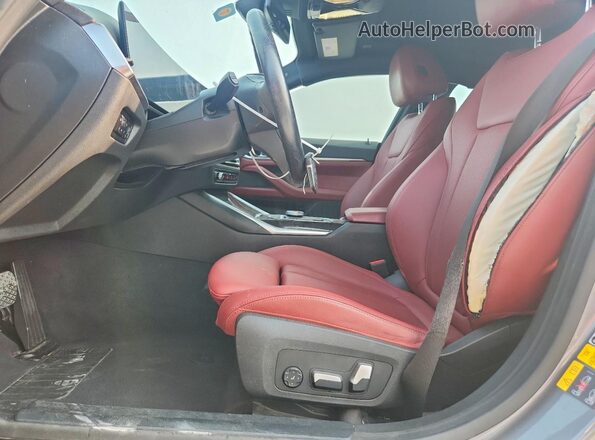 WBY43AW05RFR59926 2024 BMW I4 Silver Front interior view