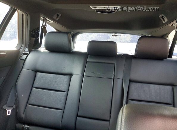 WDDHH8JB9GB172753 2016 MERCEDES-BENZ E Black Vista de los asientos traseros