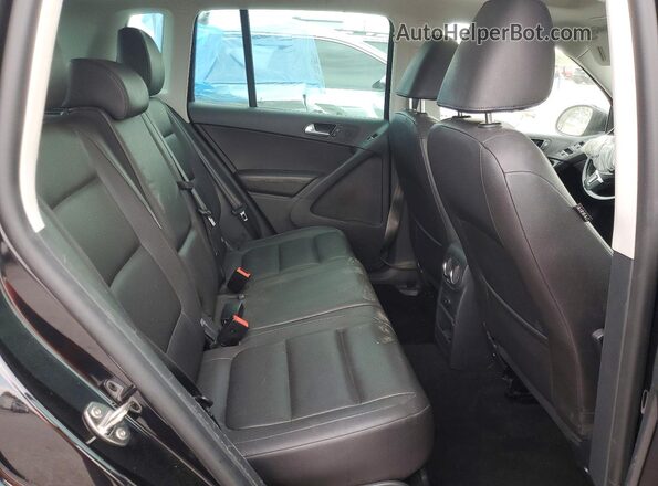 WVGAV7AX2GW554461 2016 VOLKSWAGEN TIGUAN Black Սալոնի հետևի տեսք