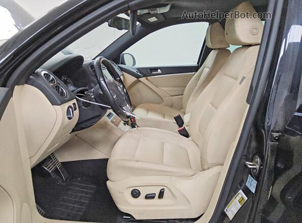 WVGAV7AX6GW088744 2016 VOLKSWAGEN TIGUAN Black Front interior view