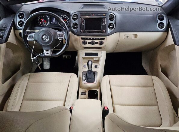 WVGAV7AX6GW088744 2016 VOLKSWAGEN TIGUAN Black Dashboard view