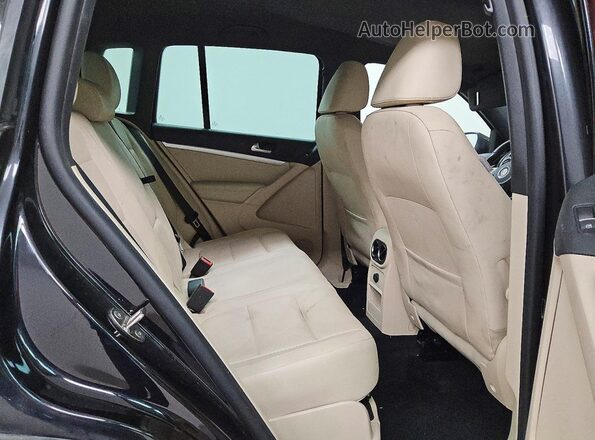 WVGAV7AX6GW088744 2016 VOLKSWAGEN TIGUAN Black Rear interior view