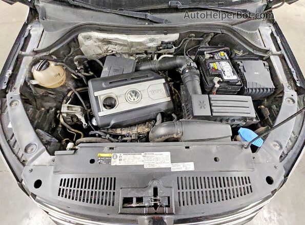 WVGAV7AX6GW088744 2016 VOLKSWAGEN TIGUAN Black Engine compartment view