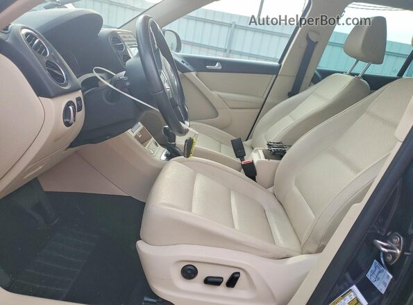 WVGAV7AX8GW561589 2016 VOLKSWAGEN TIGUAN Blue Vista interior delantera