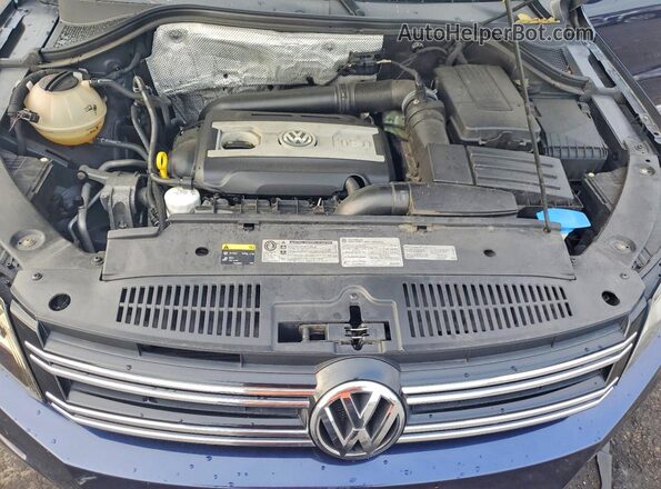 WVGAV7AX8GW561589 2016 VOLKSWAGEN TIGUAN Blue Vista interior trasera