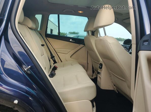 WVGAV7AX8GW561589 2016 VOLKSWAGEN TIGUAN Blue Vista de los asientos traseros
